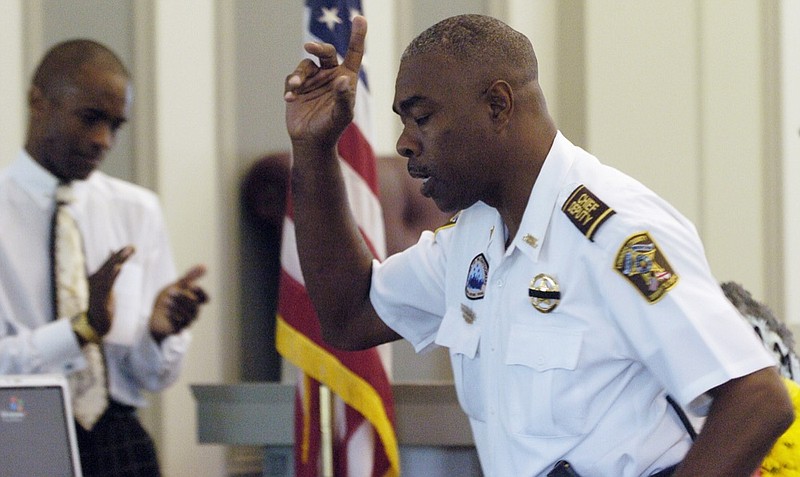 In this July 20, 2007 photo, Lowndes County Chief Deputy John Williams speaks during the memorial service for Lowndes County Sheriff Willie Vaughner at the Lowndes County Courthouse in Hayneville, Ala. Alabama Gov. Kay Ivey says Lowndes County Sheriff Williams has been fatally shot in the line of duty. Ivey said Williams was "tragically killed" Saturday evening, Nov. 23, 2019. (Mickey Welsh/Montgomery Advertiser via AP)
