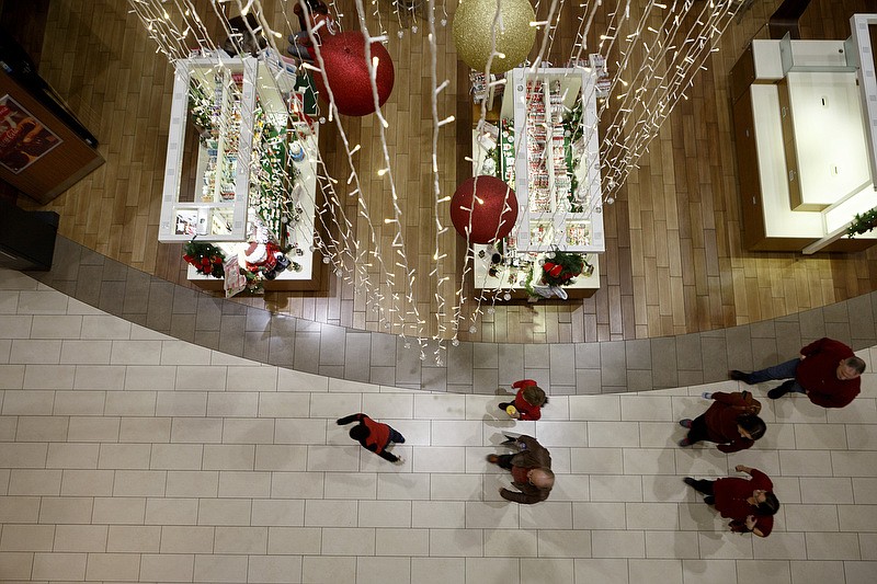 Staff photo by C.B. Schmelter / People move about at Hamilton Place Mall on Tuesday, Nov. 26, 2019 in Chattanooga, Tenn.