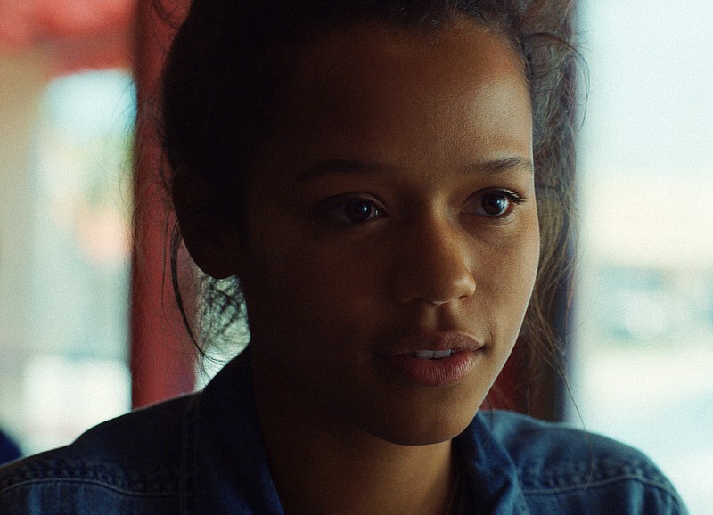 This image released by A24 shows Taylor Russell in a scene from "Waves." (A24 via AP)