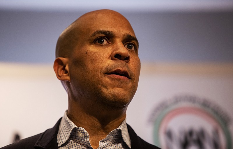 Cory Booker speaks Thursday, Nov. 21, 2019, in Atlanta. Booker, along with Pete Buttigieg, Amy Klobuchar, Andrew Yang and Tom Steyer, all presidential hopefuls, spoke at the breakfast event hosted by the Al Sharpton's National Action Network. (AP Photo/ Ron Harris)