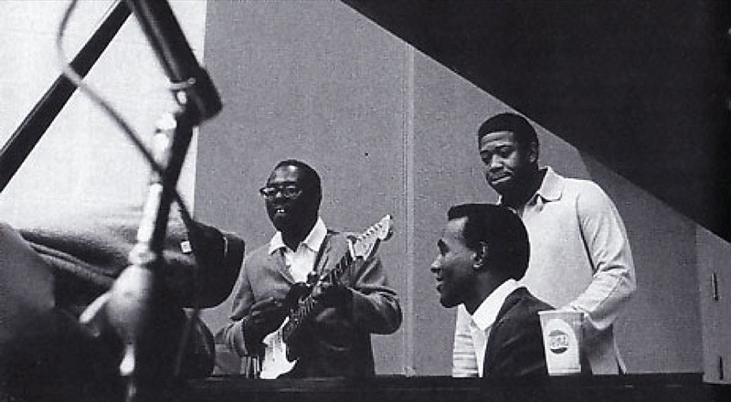 Fred Cash, standing, and Sam Gooden work in the studio with Curtis Mayfield, one of the original memberrs of the Impressions who left in 1970 for a solo career.