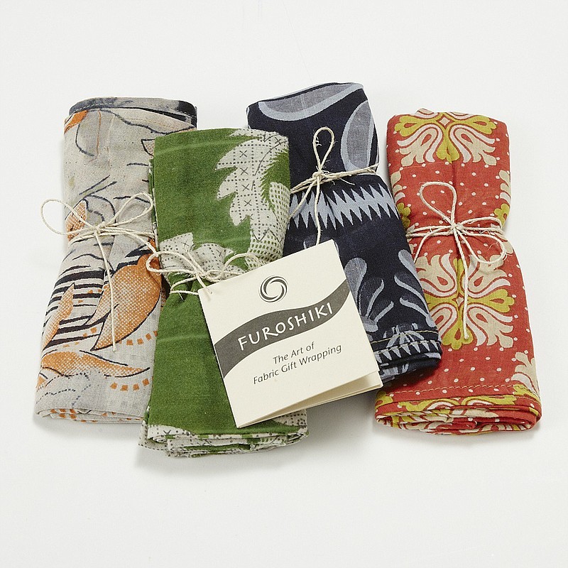 This undated product image provided by Ten Thousand Villages shows gift wrap made from saris that are recycled by artisans in Bangladesh. The company says sales have been growing steadily since the wraps were introduced in 2013; so far this year, sales are up 20% over 2018. (Ten Thousand Villages via AP)