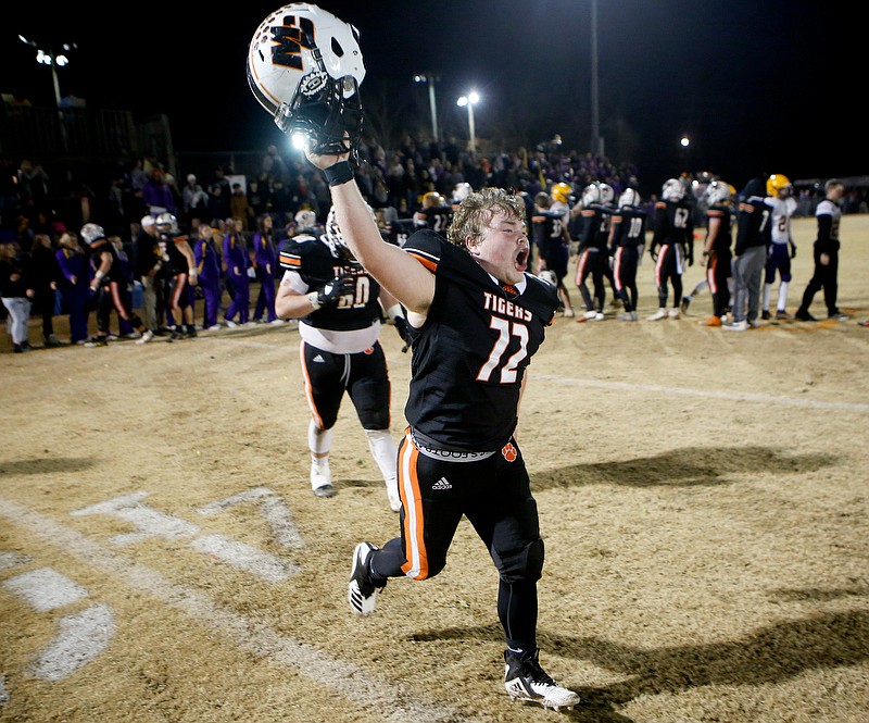 Staff photo by C.B. Schmelter / Meigs County's Andrew Waldroup celebrates after the Tigers defeated visiting Trousdale County during a Class 2A semifinal Friday night in Decatur, Tenn.