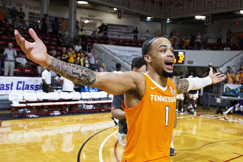 AP photo by Mark Walheiser / Tennessee senior point guard Lamonte Turner celebrates after hitting the winning shot at the buzzer against VCU in the Emerald Coast Classic third-place game Saturday in Niceville, Fla.