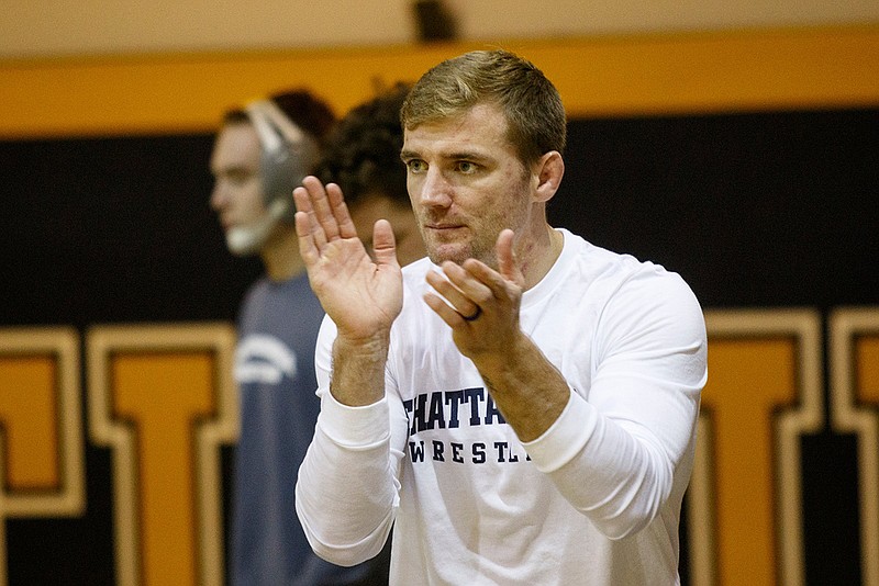 Staff file photo / UTC wrestling coach Kyle Ruschell