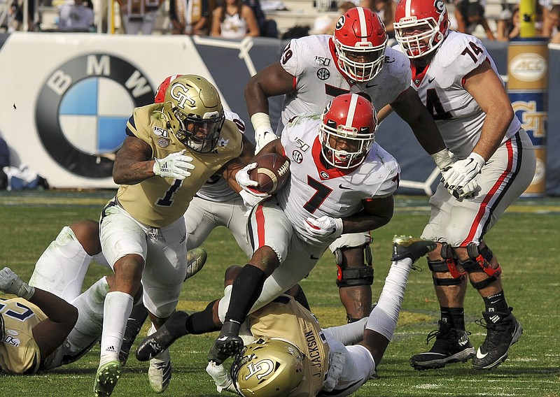 Georgia photo by Al Eckford / Georgia junior running back D'Andre Swift left Saturday's 52-7 win at Georgia Tech with a shoulder injury, but Bulldogs coach Kirby Smart believes Swift will be fine for this week's Southeastern Conference championship game against No. 1 LSU.