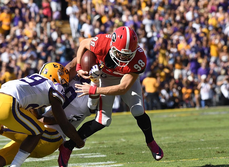 Georgia photo by Perry McIntyre / Georgia kicker Rodrigo Blankenship is stopped during a fake field-goal attempt during last year's 36-16 loss at LSU. The Bulldogs and Tigers will meet again Saturday at the Southeastern Conference championship game in Atlanta.