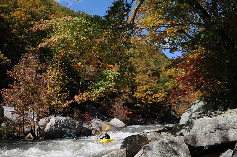 Staff file photo by Tim Barber/Chattanooga Times Free Press — Oct 15, 2012 - Andrew Gamble, center, and Danny McSpadden run the rapids in the Bowater Pocket Wilderness Monday amidst early fall colors on North Chickamauga Creek.