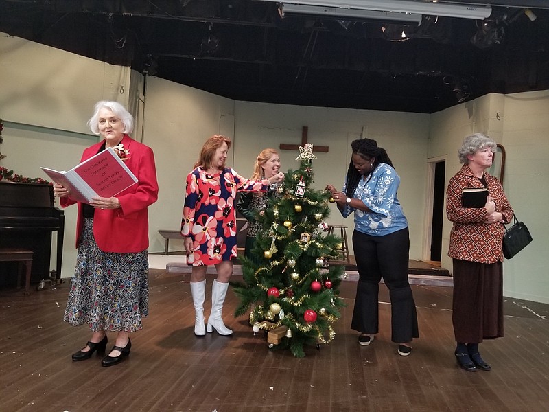 Photo by Jerry Draper / Cast members Coylee Bryan, Carol Doucette, Donna Greenwood, Kashun Parks and Vicky Quinn, from left, rehearse a scene from "The Charitable Sisterhood Christmas Spectacular."