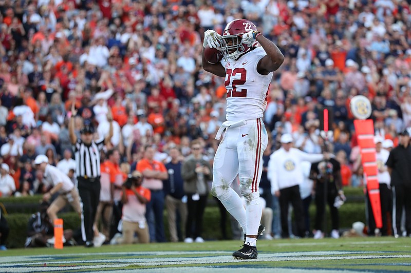 Alabama junior running back Najee Harris celebrates a first-half touchdown during last Saturday's eventual 48-45 loss at Auburn. / Crimson Tide photos