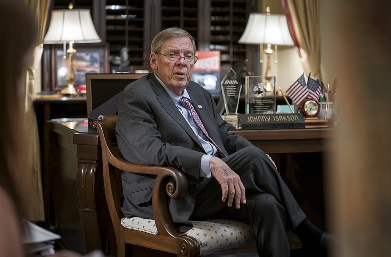 Sen. Johnny Isakson, R-Ga., meets with his staff in his office on Capitol Hill in Washington, Monday, Dec. 2, 2019, as he prepares to deliver his farewell address on the floor of the Senate tomorrow. Isakson, a three-term senator, announced last summer that he would resign from the Senate on Dec. 31 for health reasons. (AP Photo/J. Scott Applewhite)