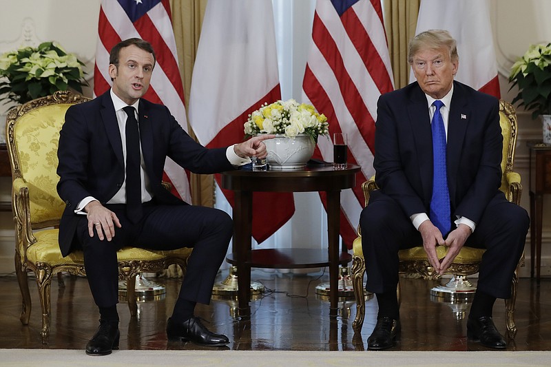 President Donald Trump meets French President Emmanuel Macron at Winfield House, Tuesday, Dec. 3, 2019, in London. (AP Photo/ Evan Vucci)