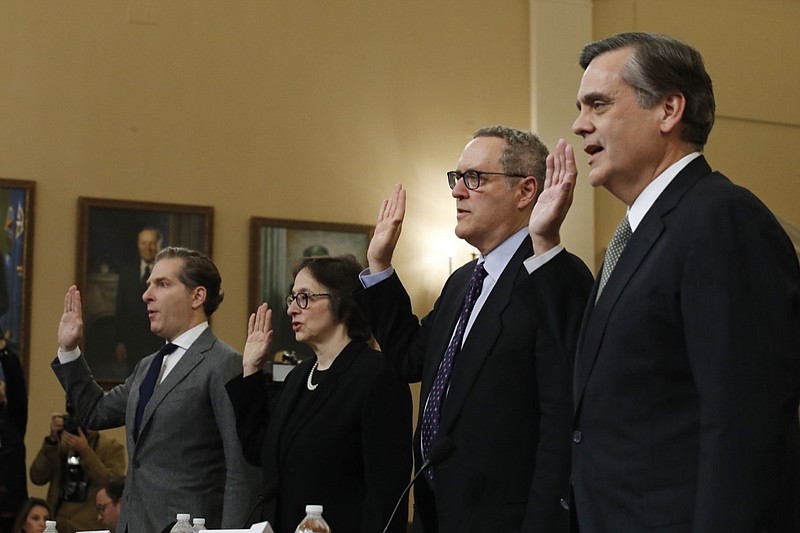 From left, Constitutional law experts, Harvard Law School professor Noah Feldman, Stanford Law School professor Pamela Karlan, University of North Carolina Law School professor Michael Gerhardt and George Washington University Law School professor Jonathan Turley are sworn in before testifying during a hearing before the House Judiciary Committee on the constitutional grounds for the impeachment of President Donald Trump, on Capitol Hill in Washington, Wednesday, Dec. 4, 2019. (AP Photo/Alex Brandon)