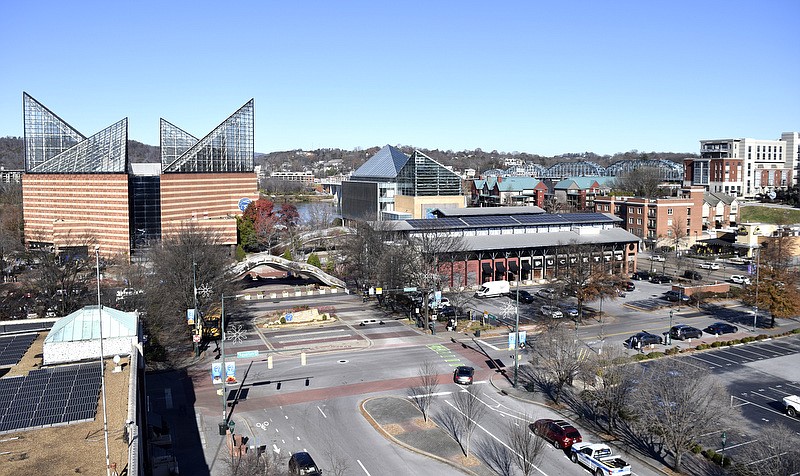 Staff Photo by Robin Rudd/  The Tennessee Aquarium anchors the riverfront in this view looking north up Broad Street from a parking garage between Broad and Chestnut Streets.  RiverCity Co. is hiring consultants to help study ways to energize the riverfront from Fourth Street to the River, including Hawk Hill. The area was photographed on December 5, 2019.   