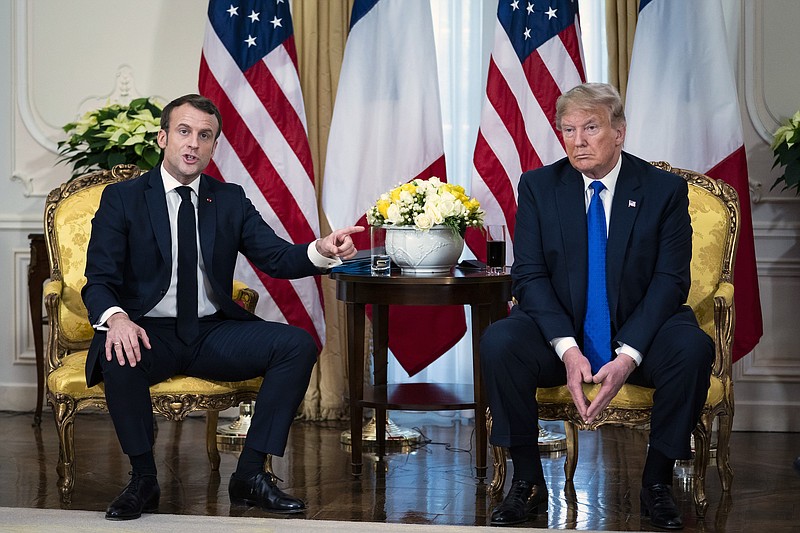 Photo by Al Drago of The New York Times / President Emmanuel Macron of France speaks during a meeting with President Donald Trump in London on Tuesday.