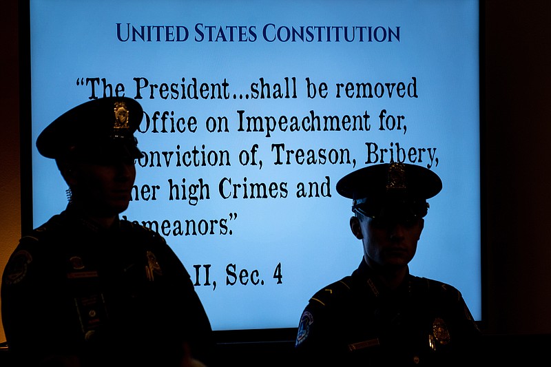 Erin Schaff, The New York Times / A portion of the United States Constitution is displayed during a House Judiciary Committee hearing in Washington this week about the constitutional standards for the impeachment of President Donald Trump.