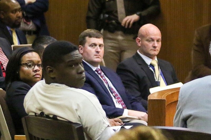 Ibrahim Yazeed, second left, appears in court for a hearing on the disappearance of college student Aniah Blanchard, on Wednesday, Nov. 20, 2019, in Opelika, Ala. Yazeed is charged with kidnapping in the disappearance of Blanchard, the stepdaughter of UFC heavyweight Walt Harris. A judge ordered Yazeed to submit a DNA sample as requested by prosecutors. (AHannah Lester/Opelika-Auburn News via AP, Pool)