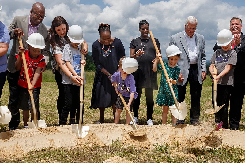 Students and officials break ground on the new Harrison Elementary School on Friday, May 10, 2019, in Harrison, Tenn. The new school will be accessed from Ferdinand Piech Way off of Tennessee Highway 58.