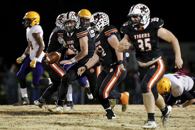 Meigs County's Aaron Swafford returns a punt during a Class 2A semifinal against visiting Trousdale County on Nov. 29. The host Tigers won 22-20 to advance to the BlueCross Bowl against undefeated Peabody. / Staff photo by C.B. Schmelter