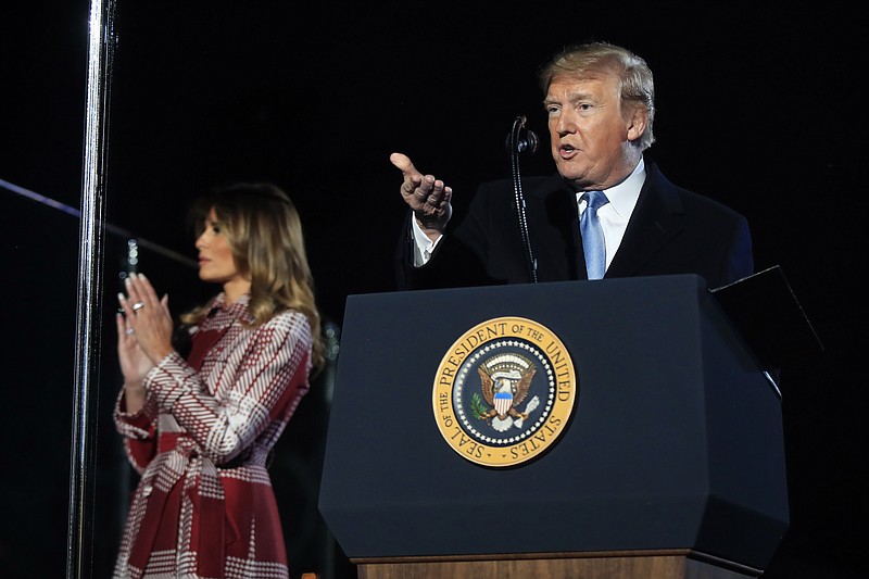 President Donald Trump and first lady Melania Trump attend the National Christmas Tree lighting ceremony at the Ellipse near the White House in Washington, Thursday, Dec. 5, 2019. (AP Photo/Manuel Balce Ceneta)