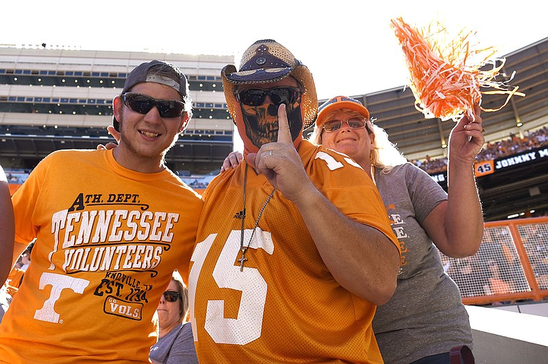 Tennessee football fans pose during the Vols' 2019 season opener against Georgia State on Aug. 31 at Neyland Stadium. / Staff photo by Robin Rudd