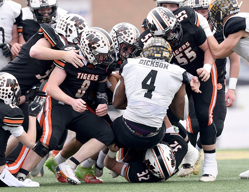 Staff photo by Robin Rudd / Meigs County's defense stops Peabody's Walter Dickson during the TSSAA Class AA football championship game on Dec. 7, 2019, at Tennessee Tech in Cookeville.