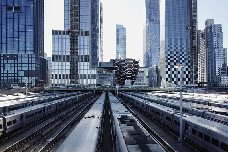 This April 1, 2019, photo shows the Long Island Railroad storage yards and buildings at Hudson Yards in New York. Amazon has signed a lease for a new office space in Manhattan that will house more than 1,500 employees, less than a year after pulling out of a deal for a larger headquarters in the borough of Queens after politicians and activists objected to nearly $3 billion in incentives. Amazon said the new office in a building near Hudson Yards will open in 2021. (AP Photo/Mark Lennihan)