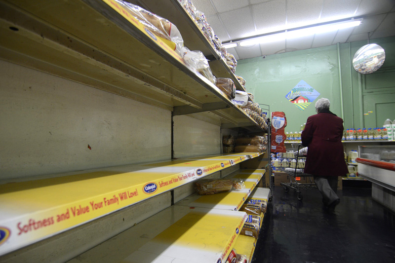 Feb 12, 2014--
The bread shelves at Buehler's Market are mostly empty Wednesday afternoon after snow in the area prompted extra bread sales. Owner Charles Morton says he has been in the business for 50 years, and the bread and milk sales have always increased in snow. Morton says they will have a fresh shipment of bread Thursday morning.