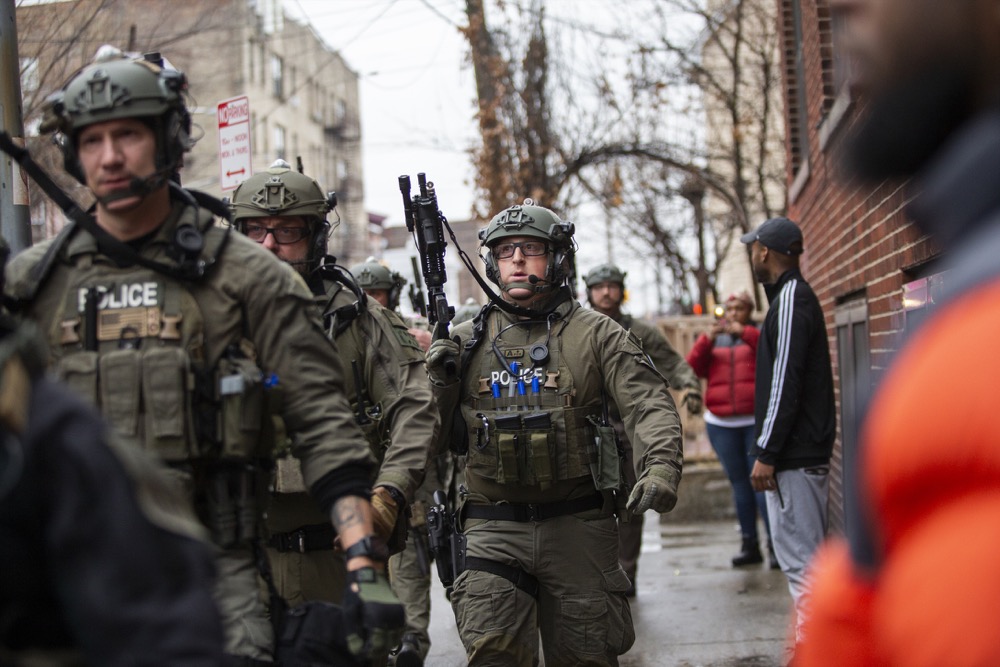 Police officers arrive at the scene following reports of gunfire, Tuesday, Dec. 10, 2019, in Jersey City, N.J. AP Photo/Eduardo Munoz Alvarez)
