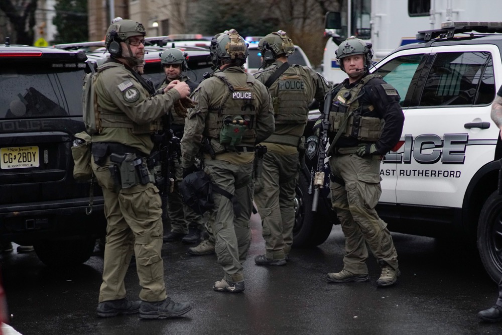 Antiterrorism unit arrive to the scene of a shooting in Jersey City, Tuesday, Dec. 10, 2019, in New Jersey. (AP Photo/Eduardo Munoz Alvarez)