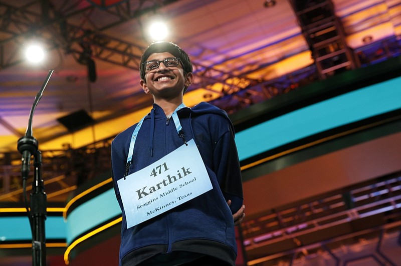 FILE - In this Thursday, May 31, 2018, file photo, Karthik Nemmani, from McKinney, Texas, smiles as he wins the Scripps National Spelling Bee in Oxon Hill, Md. (AP Photo/Jacquelyn Martin, File)


