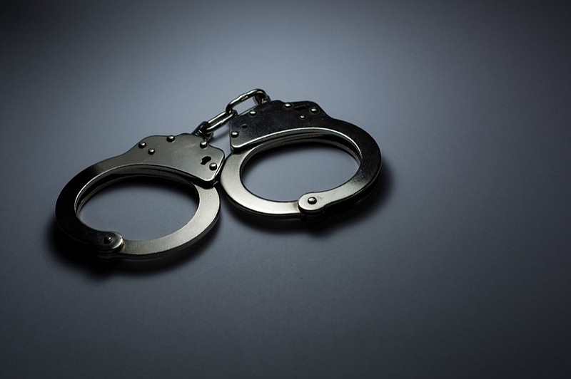 Handcuffs tile arrest crime tile arrests police criminal tile / Getty Images