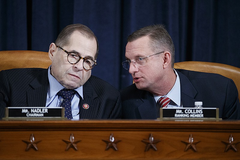 House Judiciary Committee Chairman Jerrold Nadler, D-N.Y., left, with Rep. Doug Collins, R-Ga., right, the ranking member, listening to opening statements during a markup of the articles of impeachment against President Donald Trump, on Capitol Hill in Washington, Wednesday, Dec. 11, 2019. (Shawn Thew/Pool via AP)