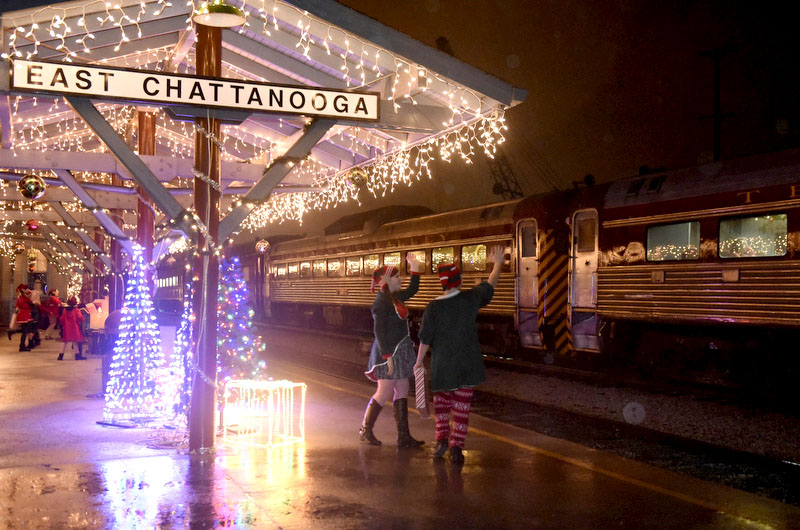 Staff Photo by John Rawlston /
Elves wave to passengers on the North Pole Limited at the Tennessee Valley Railroad Museum, on Sunday, Nov. 29, 2015, in Chattanooga, Tenn.