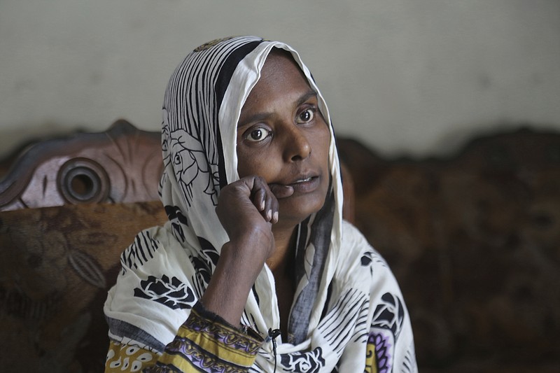 In this April 14, 2019 photo, Pakistani Christian woman Samiya David talks to the Associated Press, in Gujranwala, Pakistan. Samiya had been in China just two months when her brother got a phone call telling him to pick her up at the airport. When he arrived, he found Samiya in a wheelchair, malnourished and too weak to walk, said her cousin Pervaiz Masih. She died barely five weeks later. Masih was among the relatives who prepared Samiya's grave and attended her burial in May. (AP Photo/K.M. Chaudary)