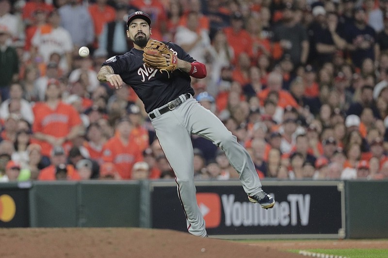 FILE - In this Tuesday, Oct. 29, 2019 file photo, Washington Nationals' Anthony Rendon throws out Houston Astros' George Springer during the third inning of Game 6 of the baseball World Series in Houston. Third baseman Anthony Rendon and the Los Angeles Angels agreed to a $245 million, seven-year contract a person with direct knowledge of the deal told The Associated Press, Wednesday, Dec. 11, 2019. (AP Photo/David J. Phillip, File)


