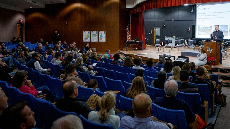 Staff photo by C.B. Schmelter / Dan Schmidt, director of MGT's Education Consulting Group, speaks during a community meeting in the David H. Crawford Theatre at Lookout Valley Middle/High School on Wednesday, Dec. 4, 2019 in Chattanooga, Tenn.