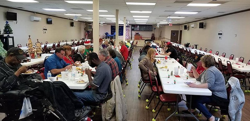 Contributed photo by Joy Pfeifer / Between 50-75 people attend a free Christmas Day dinner for active and former military members and their families hosted by Veterans of Foreign Wars Post 3679 of Chickamauga last year.