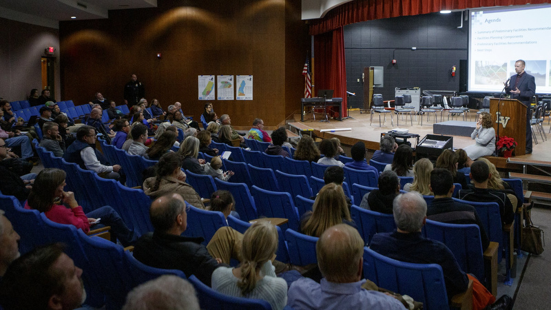 Staff photo by C.B. Schmelter / Dan Schmidt, director of MGT's Education Consulting Group, speaks during a community meeting in the David H. Crawford Theatre at Lookout Valley Middle/High School on Wednesday, Dec. 4, 2019 in Chattanooga, Tenn.