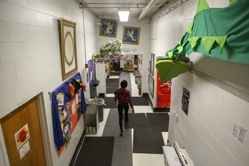 Staff photo by C.B. Schmelter / A student walks down a hall way at Chattanooga Center for Creative Arts on Tuesday, Dec. 10, 2019 in Chattanooga, Tenn.