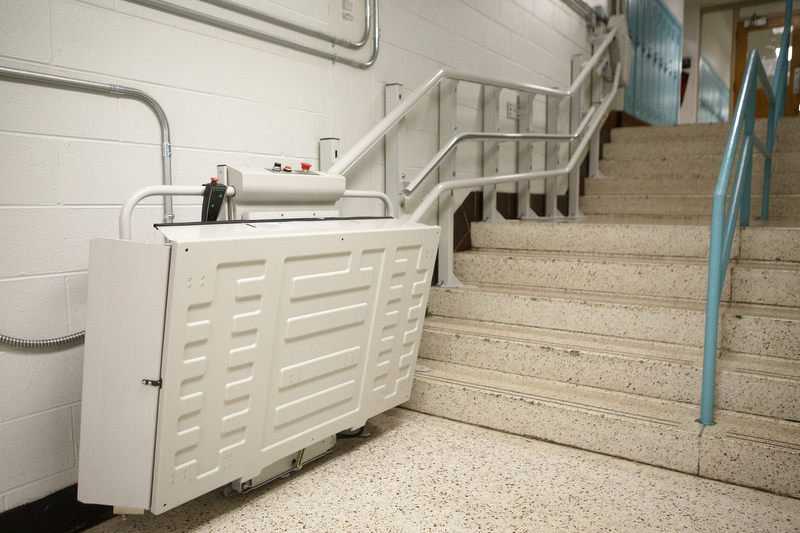Staff photo by C.B. Schmelter / A handicap lift is seen along a set of stairs at Chattanooga Center for Creative Arts on Tuesday, Dec. 10, 2019 in Chattanooga, Tenn.