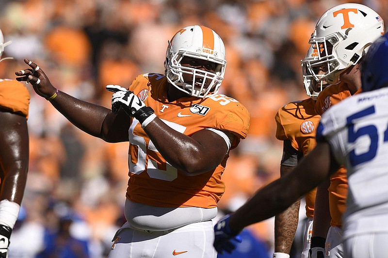 Tennessee senior center Brandon Kennedy had surgery after the Vols' regular-season finale, and his status for the Gator Bowl next month is uncertain. / Staff file photo by Robin Rudd