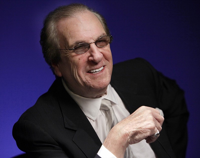 FILE - In this Friday, Oct. 7, 2011, file photo, actor Danny Aiello smiles while being photographed in New York. Aiello, the blue-collar character actor whose long career playing tough guys included roles in "Fort Apache, the Bronx," "The Godfather, Part II," "Once Upon a Time in America" and his Oscar-nominated performance as a pizza man in Spike Lee's "Do the Right Thing," has died. He was 86. Aiello died Thursday, Dec. 12, 2019 after a brief illness, said his publicist, Tracey Miller. (AP Photo/Richard Drew, File)


