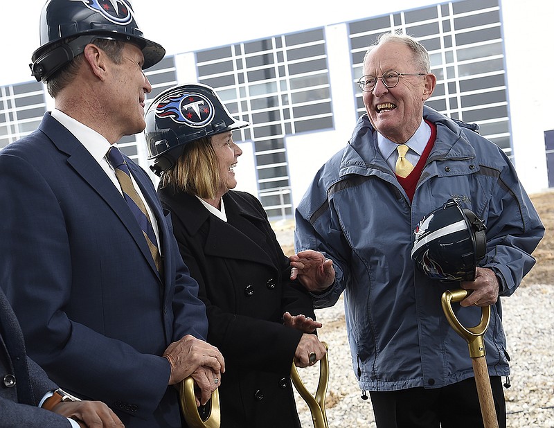 Tennessee Gov. Bill Lee, left, Tennessee Titans controlling owner Amy Adams Strunk, center, and U.S. Sen. Lamar Alexander laugh as they prepare to move dirt during a groundbreaking ceremony for the expansion of the NFL team's practice facility and corporate offices at Saint Thomas Sports Park on Friday in Nashville. / AP photo by George Walker IV