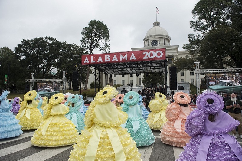 Azalea Belles take part in the Bicentennial parade in Montgomery, Ala., on Saturday, Dec. 14, 2019. (Jake Crandall /Montgomery Advertiser via AP)

