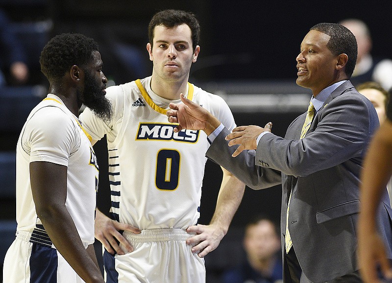 Staff photo by Robin Rudd / UTC men's basketball coach Lamont Paris instructs David Jean-Baptiste, left, and A.J. Caldwell during the Mocs' home game against Troy on Dec. 15, 2019, at McKenzie Arena. The Mocs won 84-80 in overtime.