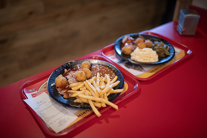 Imago Photo / Dinners at Buddy's Bar-b-q come with your choice of two sides and either hushpuppies or a bun.