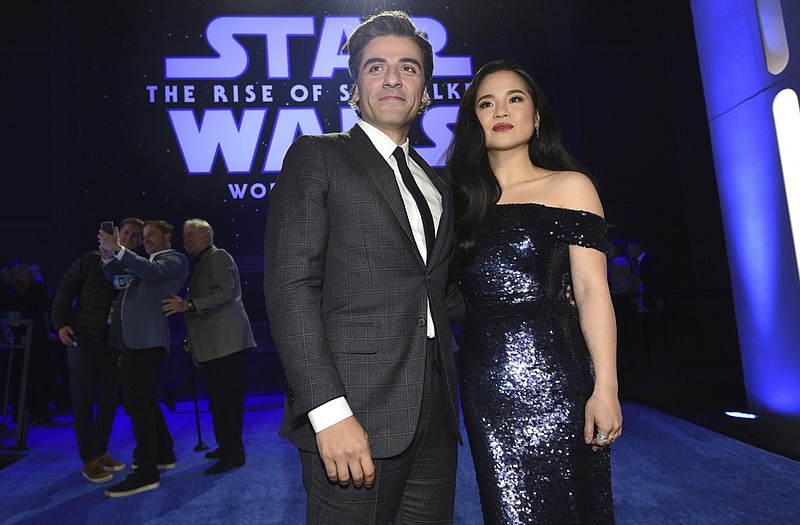 Oscar Isacc, left, and Kelly Marie Tran arrive at the world premiere of "Star Wars: The Rise of Skywalker" on Monday, Dec. 16, 2019, in Los Angeles (AP Photo/Chris Pizzello)