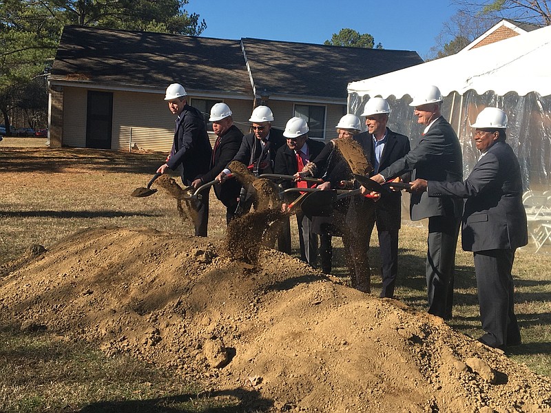 Photo by Dave Flessner / State Rep. Yusuf Hakeem, Pennrose Regional Vice Presient Mark Straub, Chattanooga Housing Authority Chairman Jim Levine, CHA President Betsy McRaue, City Council Representative Russell Gilbert and Mayor Andy Berke break ground on the redevelopment of Cromwell Hills apartments.