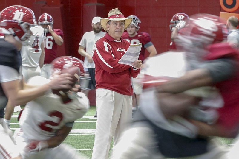 Alabama football coach Nick Saban put his Crimson Tide through practice and landed 22 early signees during a busy Wednesday in Tuscaloosa. / Alabama photo by Kent Gidley